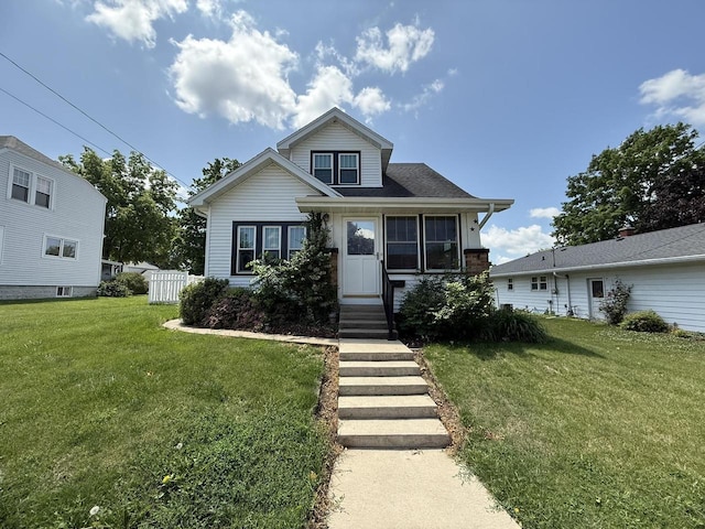 810 10th St, Monroe, WI 53566 - view of front of home featuring a front lawn and entry steps
