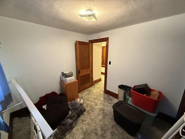 810 10th St, Monroe, WI 53566 - office area featuring carpet floors and a textured ceiling