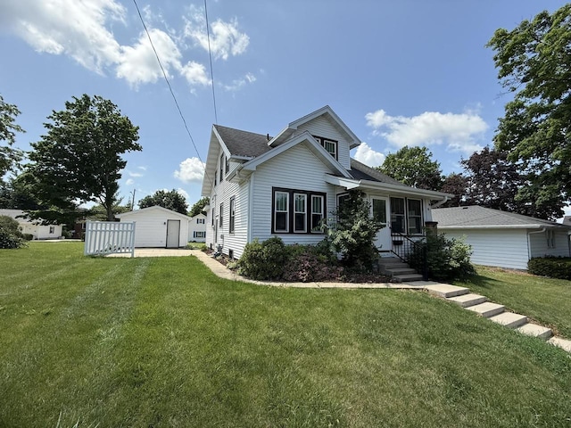 810 10th St, Monroe, WI 53566 - bungalow-style home with a front yard, roof with shingles, and a storage unit