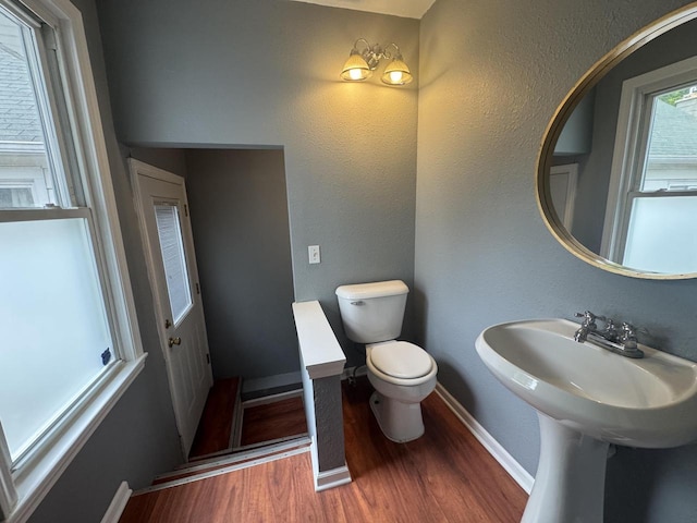 414 Barney St Unit 418, Waukesha, WI 53186 - bathroom with wood finished floors and toilet