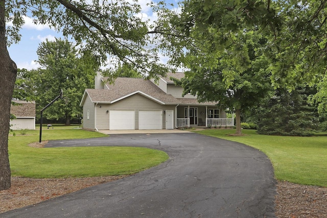 32665 Academy Rd, Burlington, WI 53105 - view of front of house featuring a porch, an attached garage, a front lawn, driveway, and a chimney