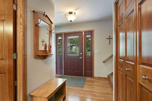 32665 Academy Rd, Burlington, WI 53105 - foyer with light wood finished floors and stairway