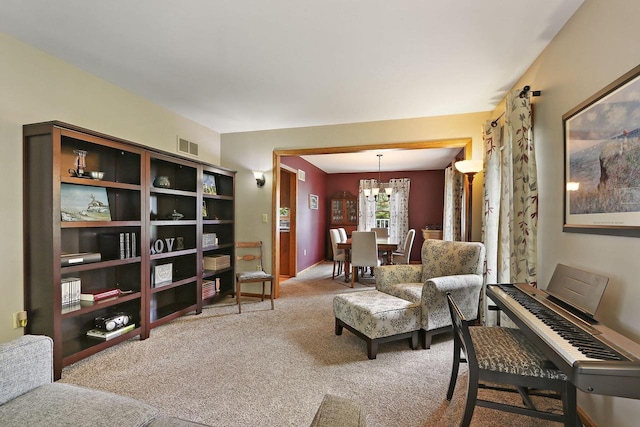 32665 Academy Rd, Burlington, WI 53105 - living area with carpet flooring and a chandelier