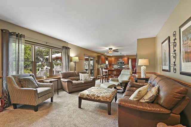 32665 Academy Rd, Burlington, WI 53105 - living area with light carpet and ceiling fan