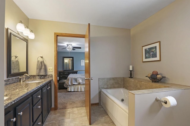 32665 Academy Rd, Burlington, WI 53105 - bathroom with double vanity, ensuite bath, a jetted tub, tile patterned floors, and ceiling fan