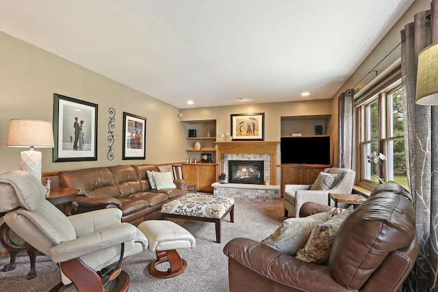 32665 Academy Rd, Burlington, WI 53105 - living room featuring carpet floors, a fireplace, built in shelves, and recessed lighting