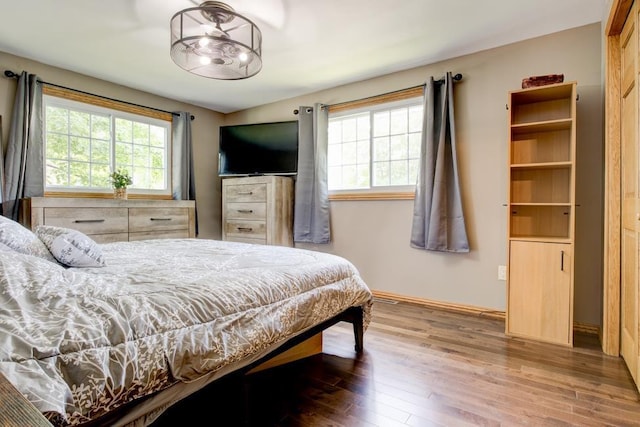 1410 Edwin St, Marinette, WI 54143 - bedroom featuring wood finished floors and baseboards