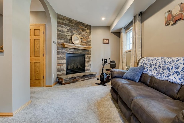 1410 Edwin St, Marinette, WI 54143 - carpeted living area with a fireplace and arched walkways