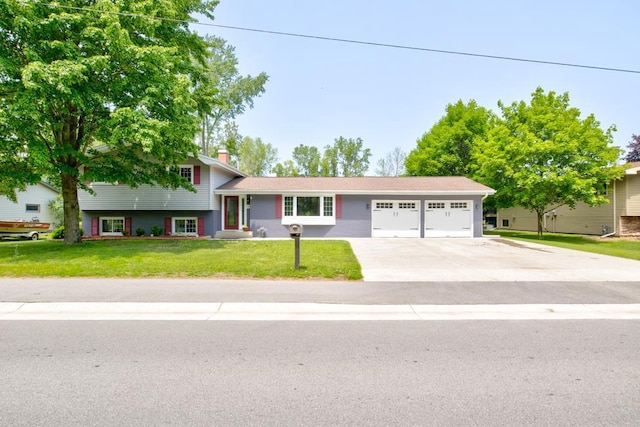 1410 Edwin St, Marinette, WI 54143 - split level home featuring a garage, a front lawn, concrete driveway, and a chimney