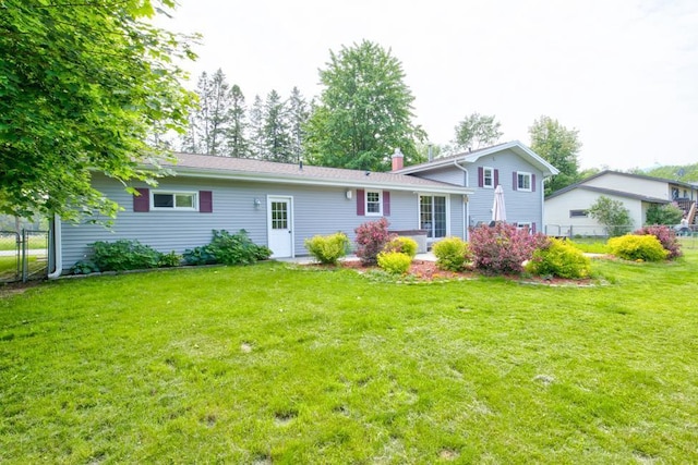 1410 Edwin St, Marinette, WI 54143 - rear view of property with a chimney