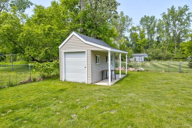 1410 Edwin St, Marinette, WI 54143 - view of outdoor structure with a fenced backyard and view of scattered trees