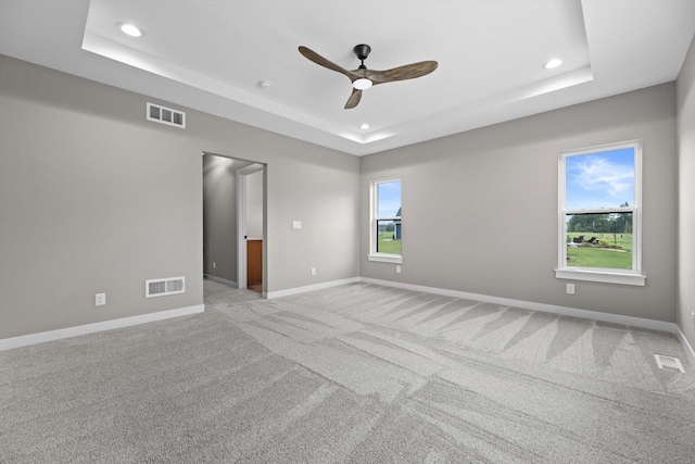 N65W34963 Baltic Pass, Oconomowoc, WI 53066 - empty room with a raised ceiling, recessed lighting, a ceiling fan, and carpet flooring