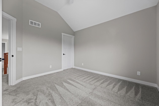 N65W34963 Baltic Pass, Oconomowoc, WI 53066 - empty room featuring carpet and lofted ceiling