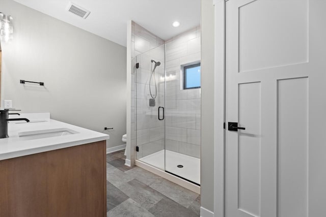 N65W34963 Baltic Pass, Oconomowoc, WI 53066 - full bath with a shower stall, double vanity, and recessed lighting