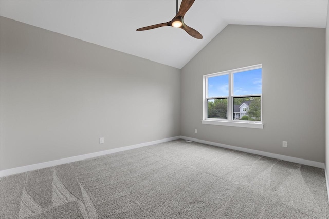 N65W34963 Baltic Pass, Oconomowoc, WI 53066 - spare room with a ceiling fan, carpet, and vaulted ceiling