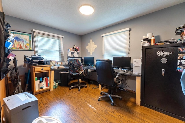 1116 Lagrange Ave, Tomah, WI 54660 - office area with wood finished floors and a textured ceiling