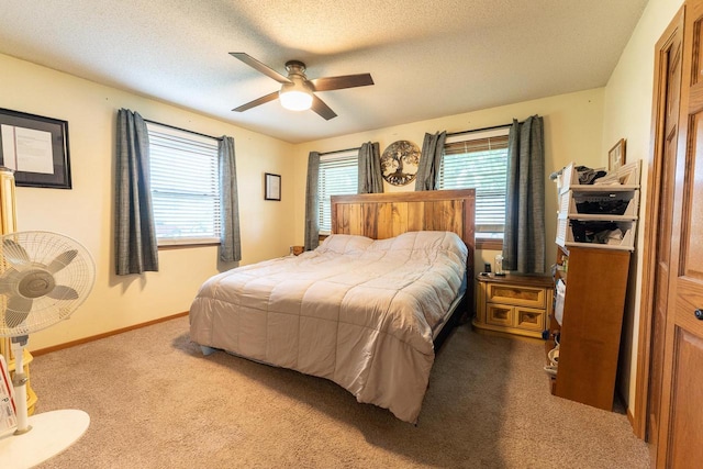 1116 Lagrange Ave, Tomah, WI 54660 - bedroom featuring carpet flooring, a textured ceiling, and ceiling fan