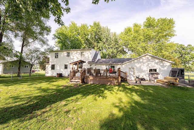1116 Lagrange Ave, Tomah, WI 54660 - back of house with a wooden deck and a patio area