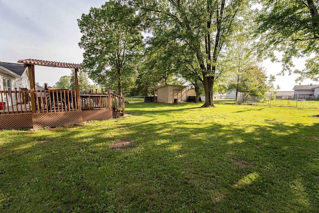 1116 Lagrange Ave, Tomah, WI 54660 - fenced backyard featuring a deck and a shed