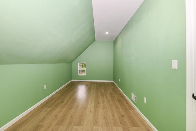 1963 S 20th St, Milwaukee, WI 53204 - additional living space featuring lofted ceiling, light wood-style flooring, and recessed lighting