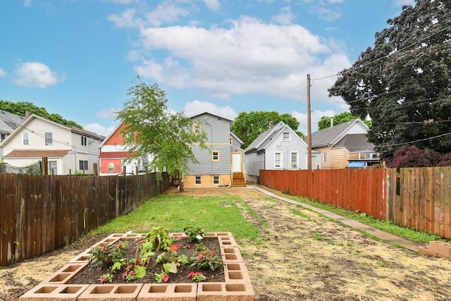 1963 S 20th St, Milwaukee, WI 53204 - fenced backyard featuring a garden