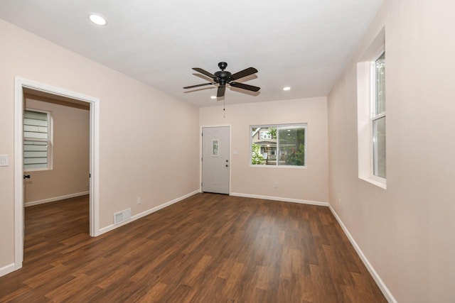 1963 S 20th St, Milwaukee, WI 53204 - unfurnished room with dark wood finished floors, ceiling fan, and recessed lighting