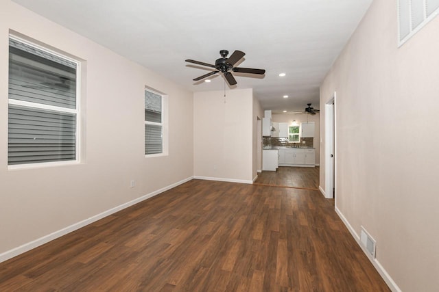 1963 S 20th St, Milwaukee, WI 53204 - empty room with a ceiling fan, dark wood finished floors, and recessed lighting