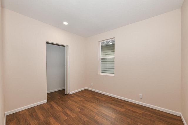1963 S 20th St, Milwaukee, WI 53204 - empty room featuring dark wood finished floors and recessed lighting