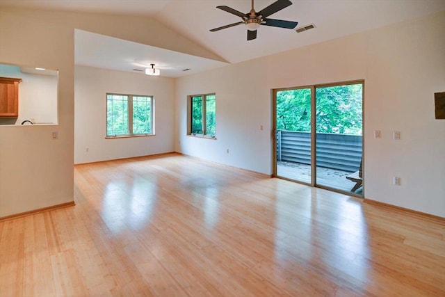 1140 E Dayton St Unit 205, Madison, WI 53703 - empty room with a ceiling fan, light wood-style flooring, and lofted ceiling