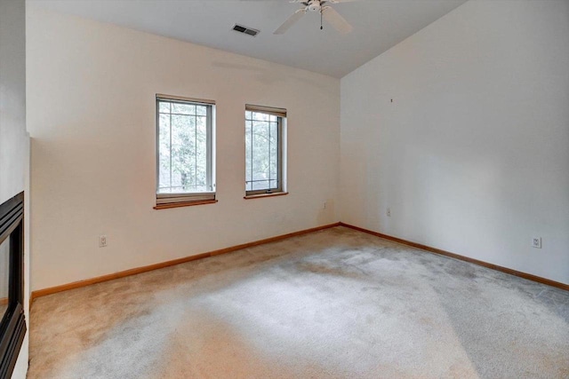 1140 E Dayton St Unit 205, Madison, WI 53703 - carpeted empty room featuring a ceiling fan and lofted ceiling