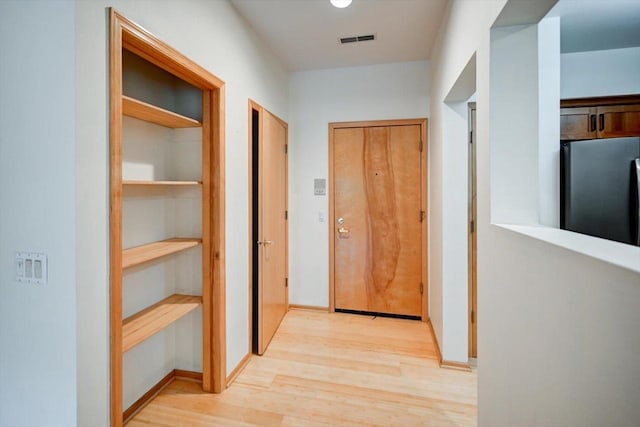 1140 E Dayton St Unit 205, Madison, WI 53703 - hall with light wood-type flooring and baseboards