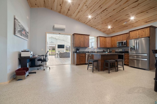 4304 E Leggate Rd, Superior, WI 54880 - kitchen with appliances with stainless steel finishes, wood ceiling, dark countertops, a breakfast bar, and a center island