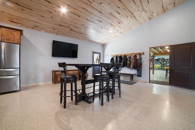 4304 E Leggate Rd, Superior, WI 54880 - dining room with wooden ceiling, speckled floor, and high vaulted ceiling