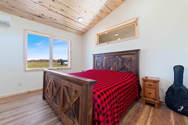 4304 E Leggate Rd, Superior, WI 54880 - bedroom with light wood finished floors, wood ceiling, a wall mounted air conditioner, recessed lighting, and lofted ceiling