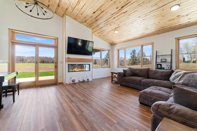 4304 E Leggate Rd, Superior, WI 54880 - living area with wooden ceiling, wood finished floors, a large fireplace, and high vaulted ceiling