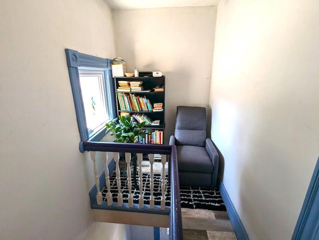 225 Caledonia St, La Crosse, WI 54603 - living area with baseboards and wood finished floors