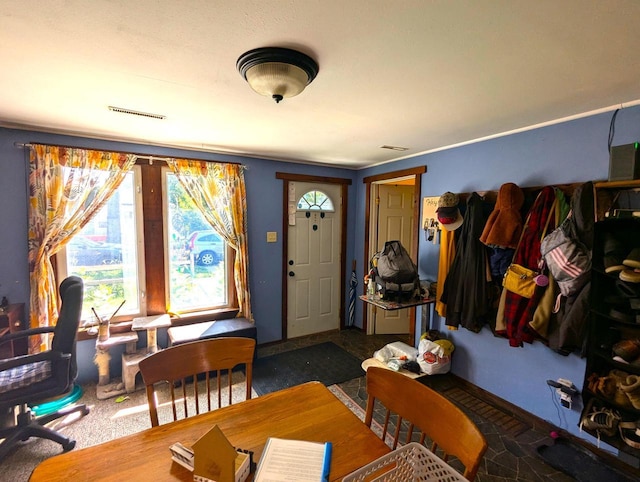 225 Caledonia St, La Crosse, WI 54603 - carpeted dining space with baseboards