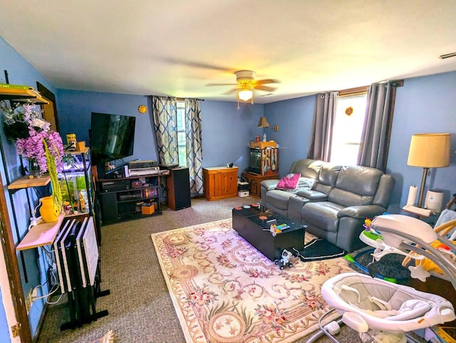 225 Caledonia St, La Crosse, WI 54603 - living area with ceiling fan and carpet floors