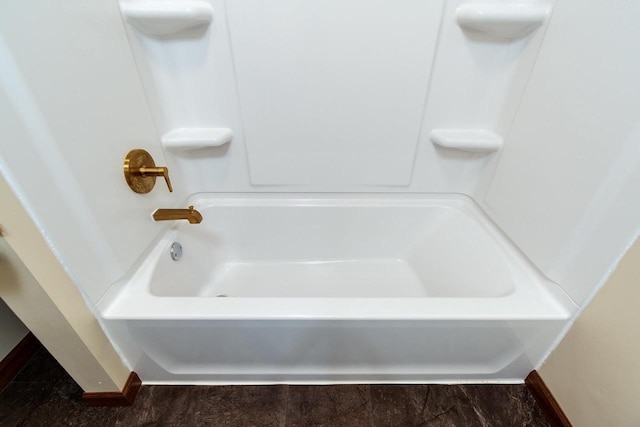 1140 Bluff St, Beloit, WI 53511 - full bath featuring baseboards and shower / bathtub combination