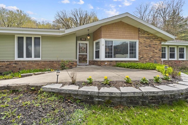 611 Mount Snowdon Rd, Wales, WI 53183 - back of property featuring brick siding