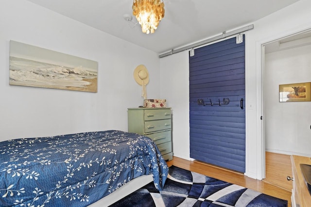 611 Mount Snowdon Rd, Wales, WI 53183 - bedroom featuring wood finished floors