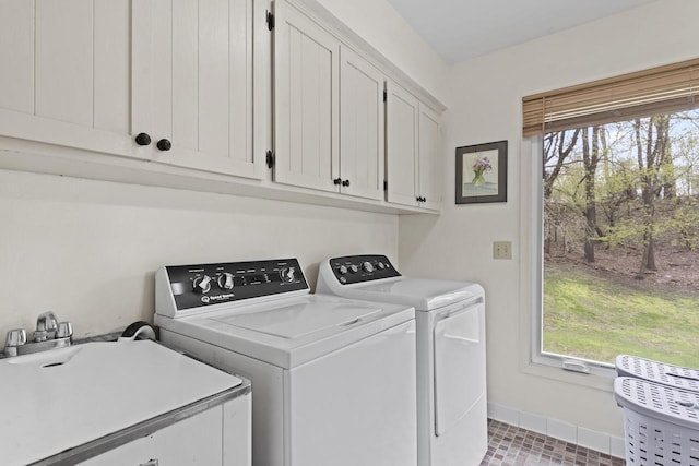 611 Mount Snowdon Rd, Wales, WI 53183 - washroom with cabinet space and washing machine and dryer