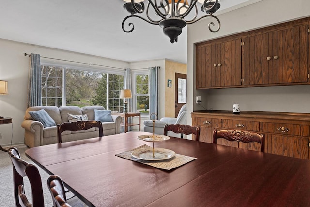 611 Mount Snowdon Rd, Wales, WI 53183 - dining room featuring a chandelier