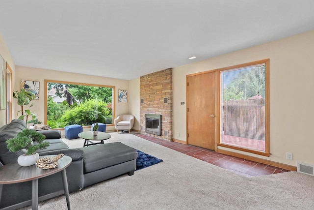 5463 N Lydell Ave, Glendale, WI 53217 - carpeted living area featuring a stone fireplace and tile patterned flooring