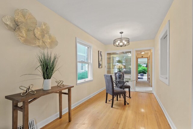 5463 N Lydell Ave, Glendale, WI 53217 - sitting room featuring a chandelier and light wood finished floors