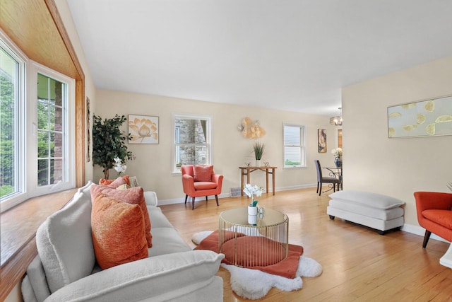 5463 N Lydell Ave, Glendale, WI 53217 - living area with light wood finished floors and a chandelier