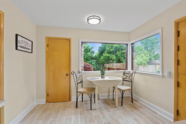 5463 N Lydell Ave, Glendale, WI 53217 - dining space featuring baseboards and light wood-style flooring