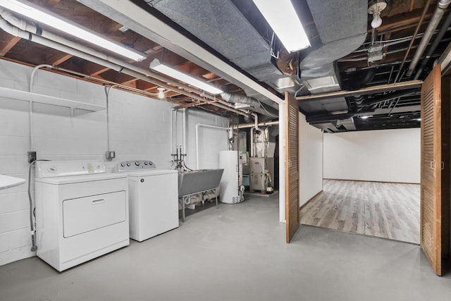 5463 N Lydell Ave, Glendale, WI 53217 - unfinished basement with water heater, washing machine and clothes dryer, and heating unit