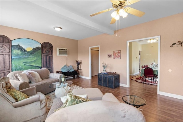 110 1st Ave, Balsam Lake, WI 54810 - living area featuring beam ceiling, wood finished floors, a ceiling fan, and an AC wall unit