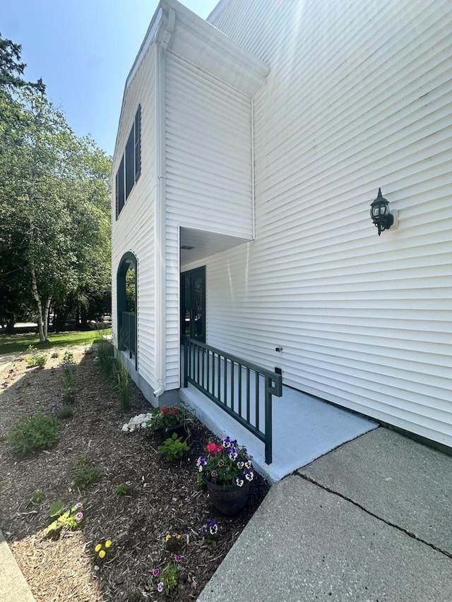 266 Victorian Village Dr Unit 226, Elkhart Lake, WI 53020 - view of property exterior with covered porch